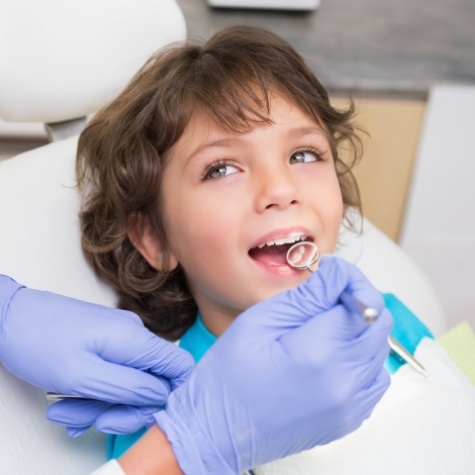 Child receiving a dental exam